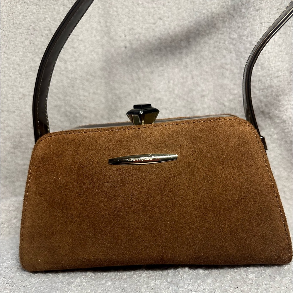 Lady's bag . Natural suede . There are lacquered inserts on the sides. New.